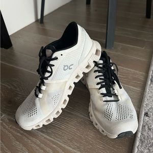 On Cloud white sneakers with black laces